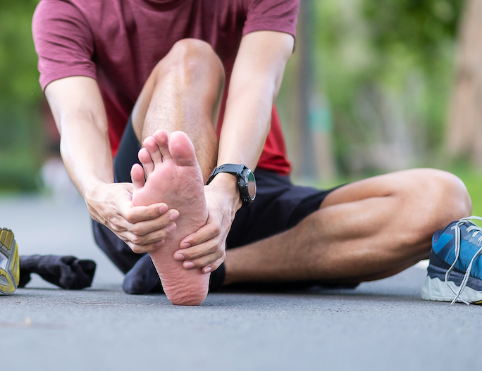a man suffering from heel pain